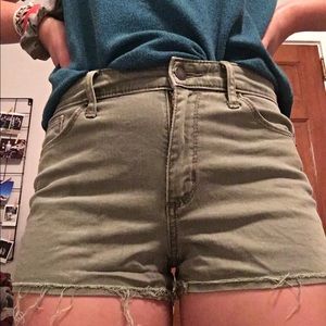 Green high waisted shorts.